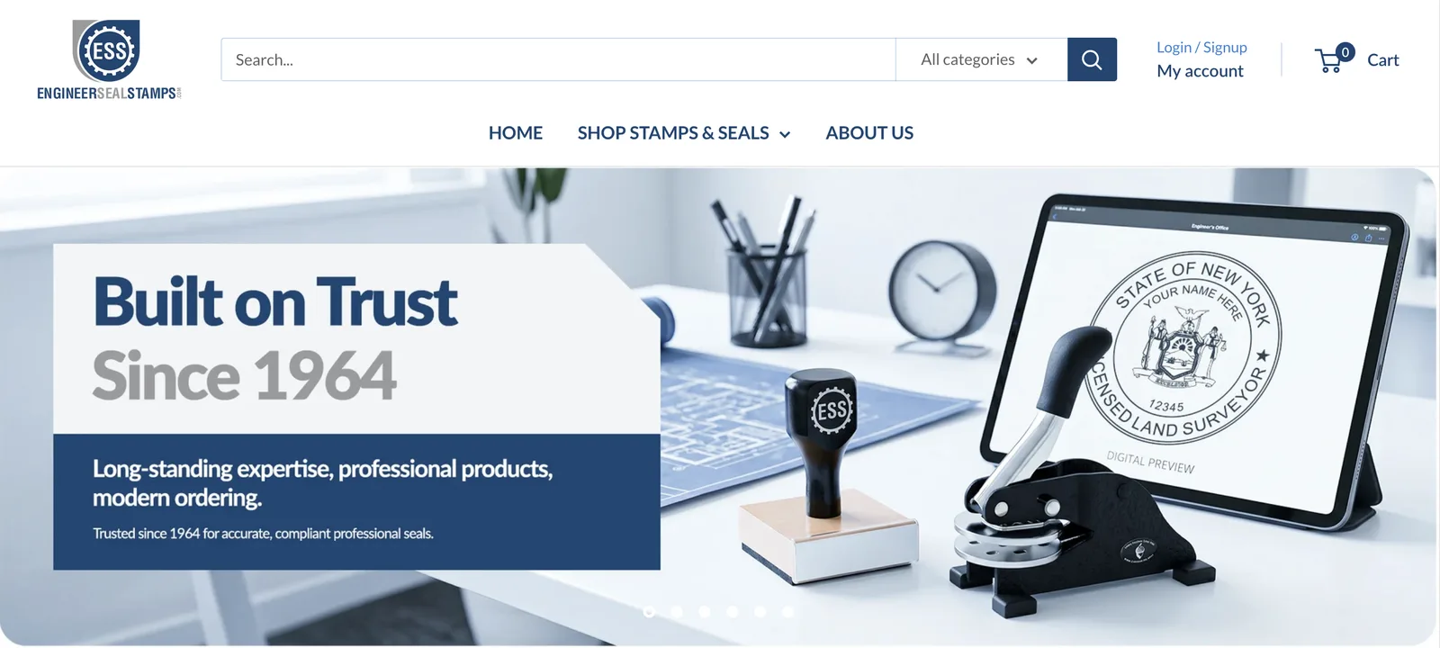 The Engineer Seal Stamps Shopify store: “Built on Trust Since 1964”, with a stamp and an embosser on a desk.